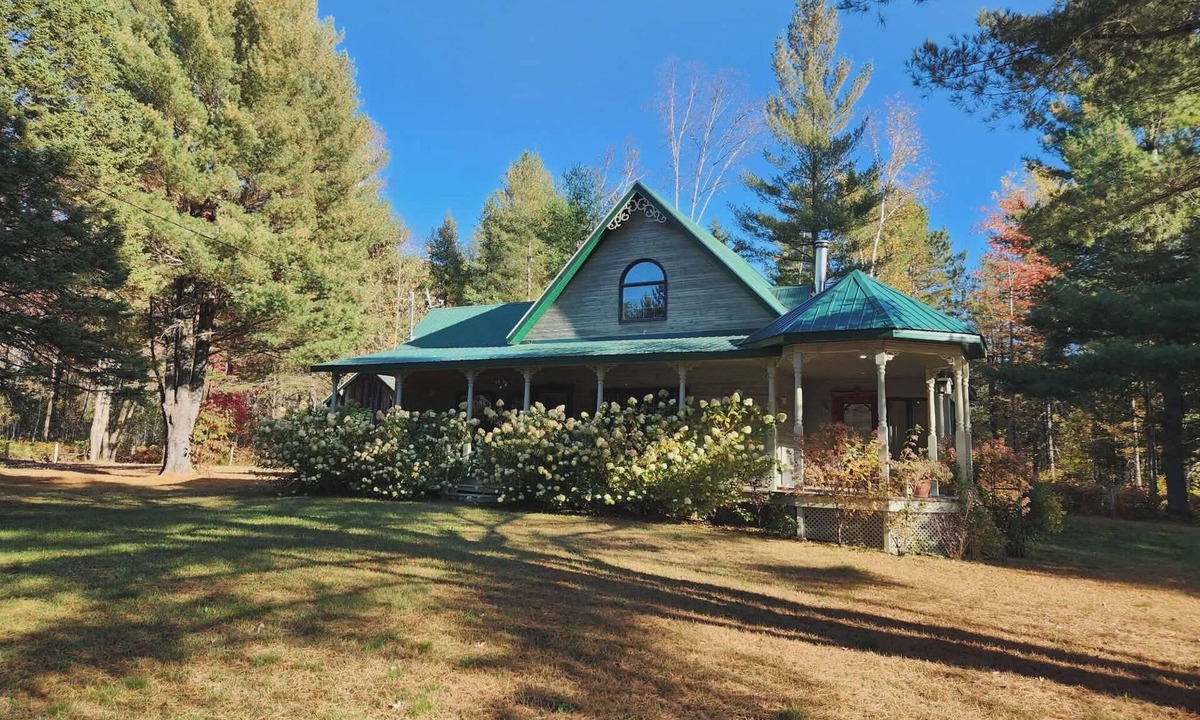 Mandeville Ski Chalet | A small, rustic cabin surrounded by trees, with access to an alpaca farm!