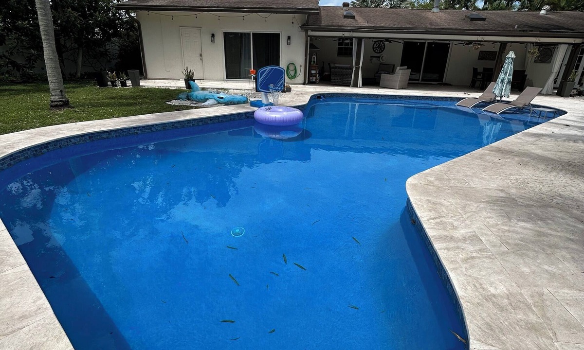 Palm Aire Village West House | Fantastic Lakefront Home With Private Yard and Pool