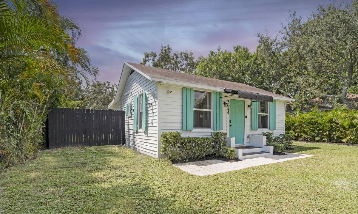 Westgate House | House with Fenced Yard - Palm Wave Says -