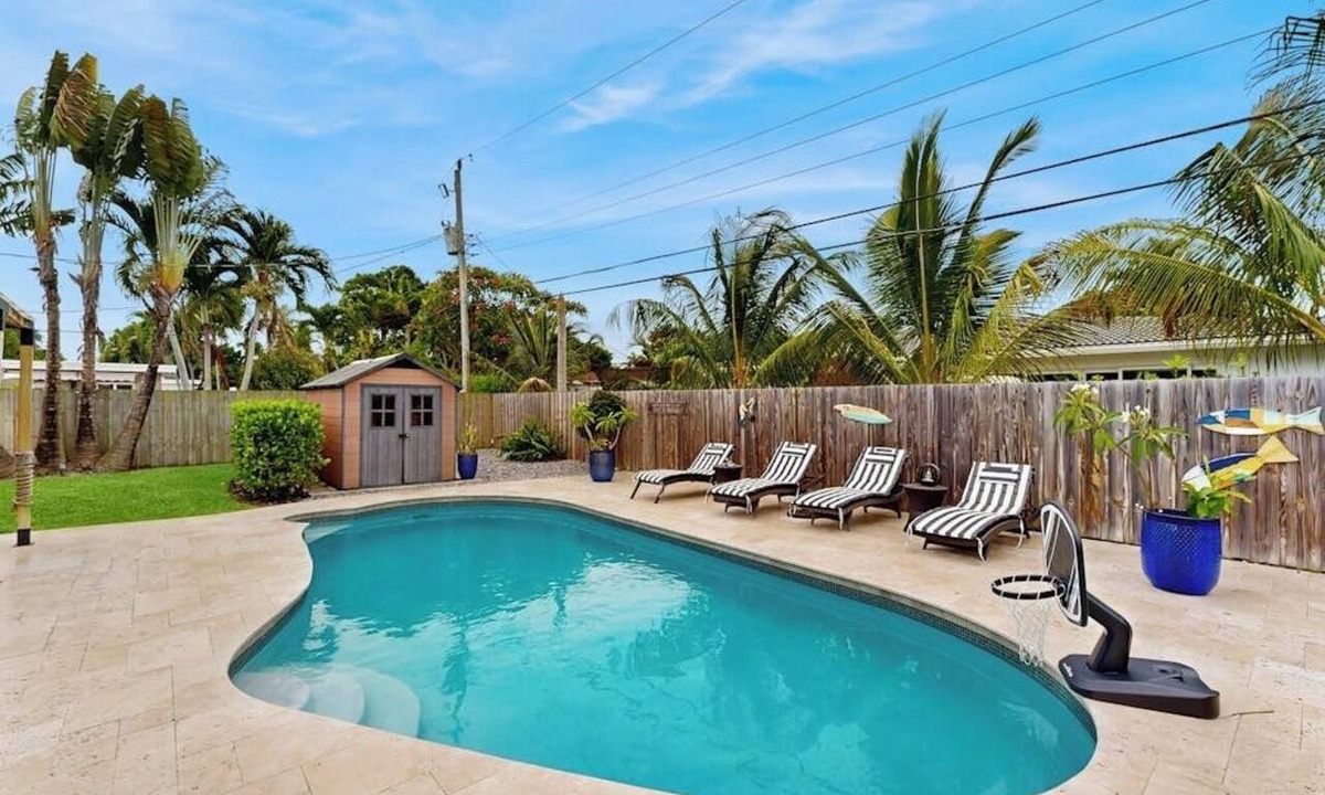 Coral Heights House | Inviting villa with heated saltwater pool & tropical backyard oasis