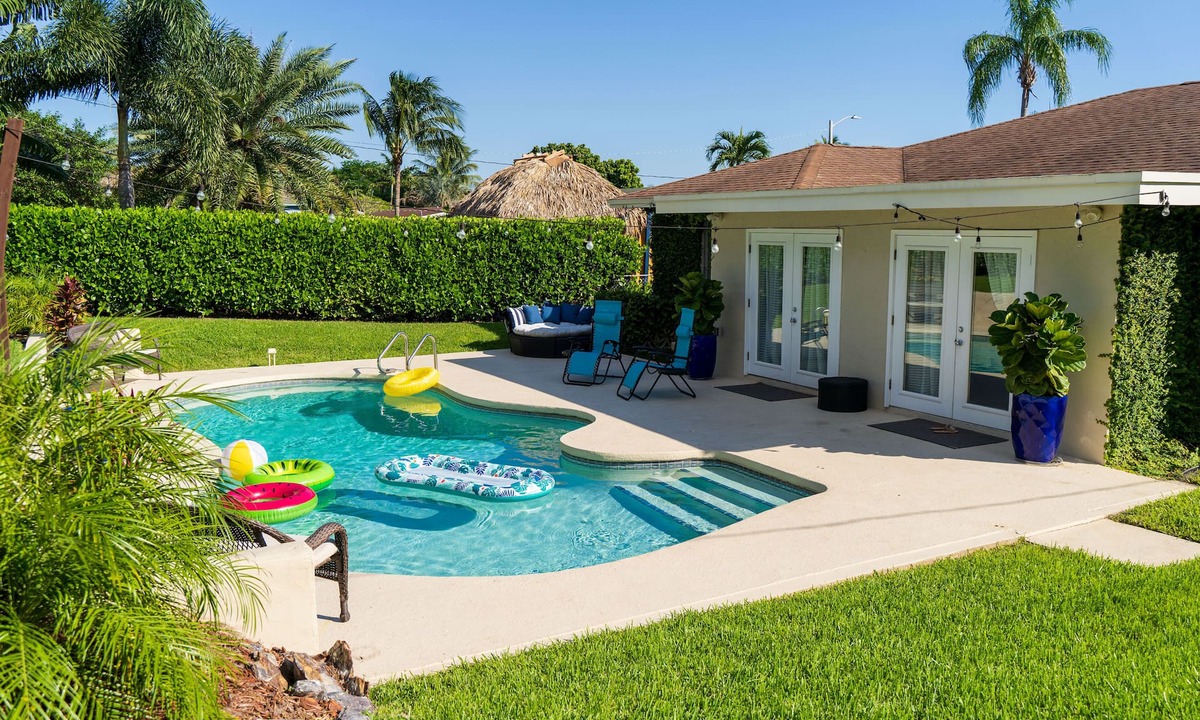 Lake Worth Corridor House | Poolside Paradise Luxury home Mins from the beach
