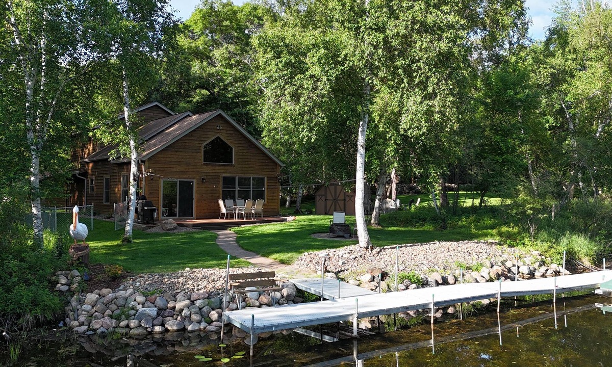 Breezy Point House | Spacious Summer Escape: Private Backyard, Dock & Fire Pit, Channel Waterfront