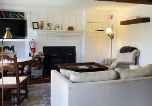 Deluxe King Suite, Living Room w/sofa bed & fireplace