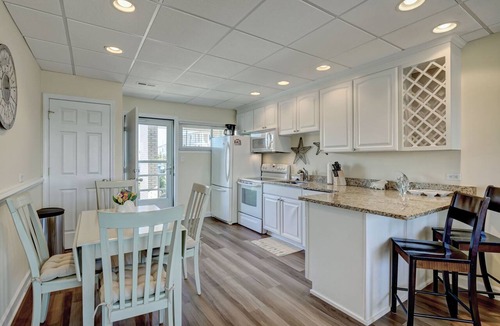 South End Condo | 202 Banks Channel - Beautifully updated condo w/sound front views. Sleeps 4.