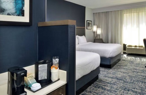 Downtown Wilmington Hotel | 3 Units | 2 Queen Beds | Steps from Riverwalk, Shops, and Local Dining