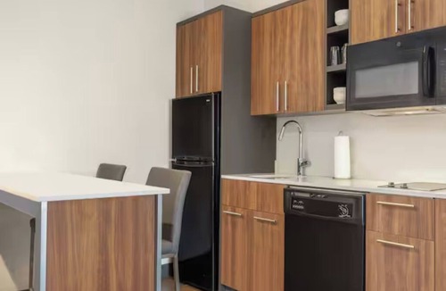 Houston Hotel | 4 Suites Ideal for Exploring Houston Highlights | AMF Diamond Lanes - 1.5 miles