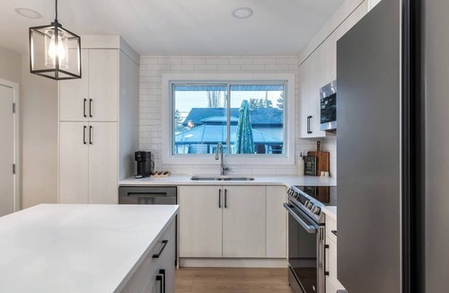 Southeast Calgary House | Alpine Elegance | Modern 5-BR | 2 Full Kitchens!