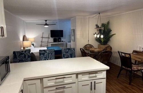 Punaluu Condo | Beach Front Condo w/Beautiful Sunrises on Private Sandy Beach with Calm & Gentle Waves