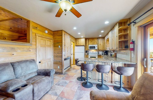 Alpine Village Cabin | Beautiful mountain-view cabin with covered deck, grill, fireplace & washer/dryer