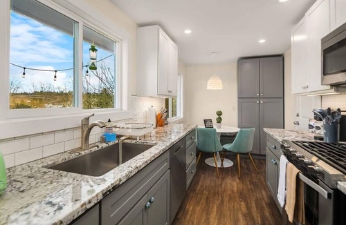West Bellevue House | Bellevue DT House Yellow Door Billiard Gym