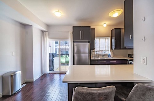 Mount Hope Huron Park Villa | ✦Boho-Chic Home: 4 BR + ❤ of City + Patio & BBQ
