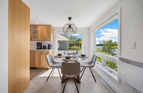 Carden Cottage | Charming Lakefront Cottage with Sauna, Fire Table & Sunset Views
