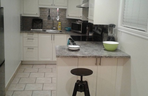 Laval-des-Rapides Apartment | Comfortable apartment, half basement and 3 min walk from Concorde metro station