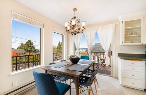 University Place House | Comfortable home with Puget Sound view, decks, garden patio, WiFi & W/D