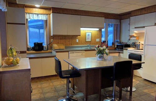 Mont-Saint-Michel Ski Chalet | Cozy Rustic Lakefront Chalet with Breathtaking Views