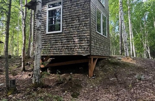 Houston House | Cozy Tiny Cabin Getaway with Kids Play Area, Firepit and Picnic Tables in Houston, Alaska