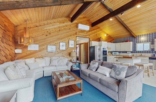 Orondo House | Dog-friendly waterfront home with pool, tennis courts, & large lawn