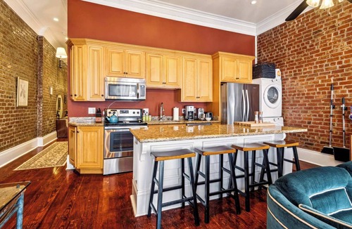 Lower Garden District Apartment | Elegant Condo w Balcony on Magazine St. 2br|1ba