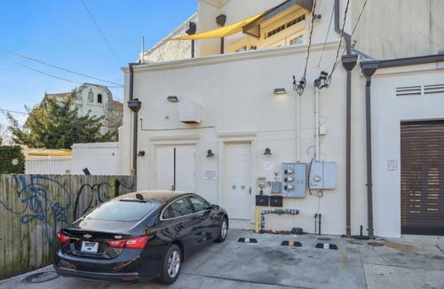 Lower Garden District Apartment | Elegant Condo w Balcony on Magazine St. 2br|1ba