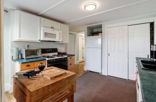 Gloucester Apartment | Elevated Fish & Ships on River Walk to Beach Park