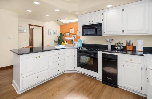 Maple Heights-Lake Desire House | European White Castle on Lake Desire, Private Dock