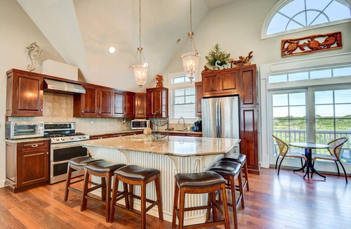 North Topsail Beach House | Experience luxury at Footprints: a spacious 6-bedroom oceanfront home in North Topsail Beach.