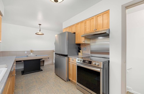 Longmont House | Family Friendly Central Retreat with Covered Patio, AC, Fenced Yard