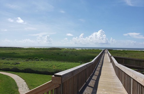Red Fish Cove Condo | Family sized Condo with bay views AND gulf views. Short walk to the beach!
