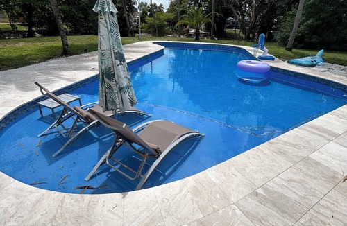 Palm Aire Village West House | Fantastic Lakefront Home With Private Yard and Pool