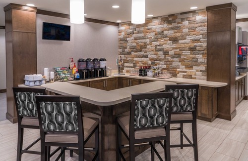 Midtown Anchorage Apartment | Free Breakfast Buffet Included. Pool, Hot Tub, & Gym Access!