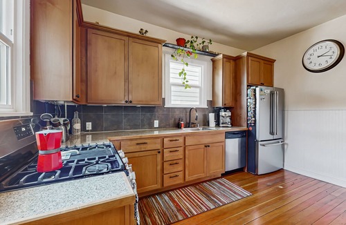 Central District House | Historic 1903 Home with Typewriter Charm & Timeless Soul