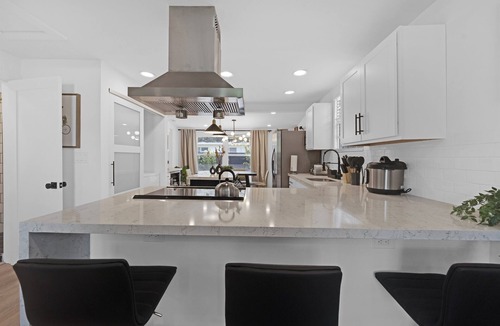 Westgate House | House with Fenced Yard - Palm Wave Says -