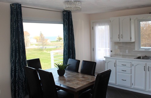 Saint-Joseph-de-Kent House | House with multi-level deck and water views in Bouctouche