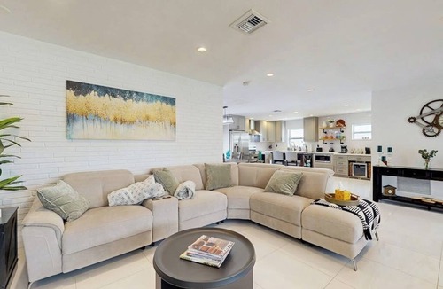 Coral Heights House | Inviting villa with heated saltwater pool & tropical backyard oasis