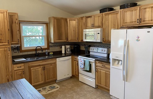 Colington Cottage | Key-lime Pie! Enjoy the Large Front deck; Family game room and outdoor fire pit