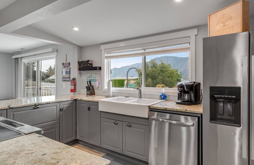 Manson House | Lake view oasis w/private hot tub & deck - Walk to downtown & lake