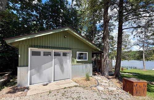 East Jordan Cabin | Lakefront Rustic Cabin Retreat with Outdoor Shower
