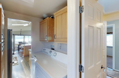 Manson House | Lakeview home with wrap-around deck, easy lake access, private hot tub, & more