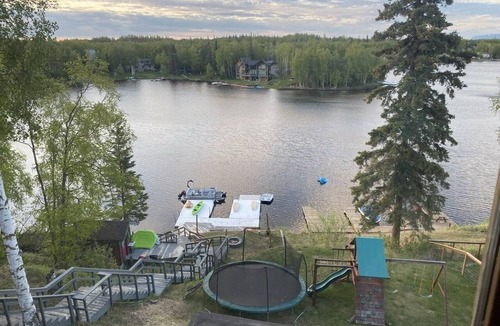 Sand Lake House | Large luxurious lakefront home with water toys & mountain view