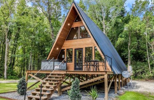 New Iberia Ski Chalet | Luminous Elegant A-Frame with Jacuzzi and Lofted Areas in Louisiana