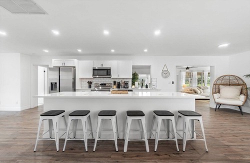 West Palm Beach House | Luxury Coastal Oasis with Heated Pool and 4BR Family Retreat Near Beaches