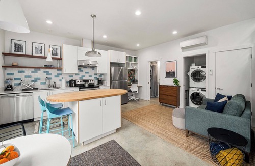 West Woodland House | Modern Home in Ballard - Workspace and EV Parking