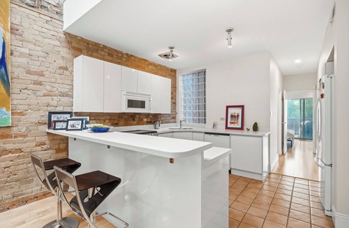 Garden District Apartment | Modern, Spacious 2 level in Downtown Historic Building - FIFA Ready!
