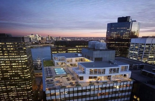 Financial District Apartment | Modern Studio with Chef’s Kitchen Bar, Dedicated Workspace & Home Theater
