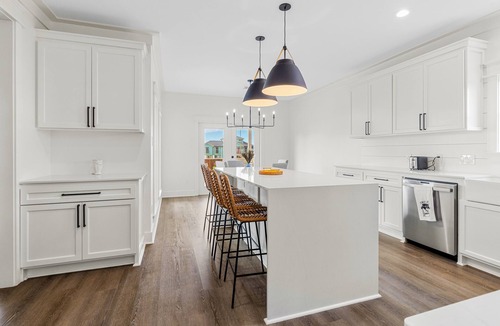Creole House | Modern waterfront home with boat lift, dock, game tables, kayak, & AC