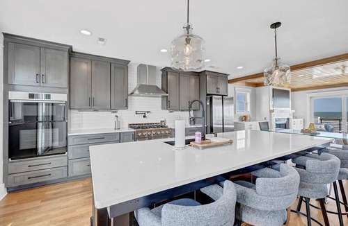 Topsail Beach House | Namaste #216 - Dog Friendly Oceanfront Escape with Elevator, Loft, and More.