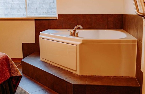 Puposky Villa | Northwoods Cabin Retreat - Steps to Resort Pool & Activities