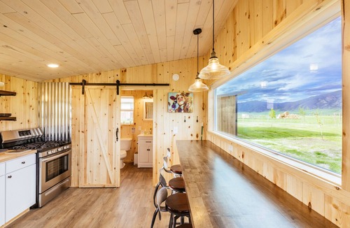 Whitehall House | Off-grid tiny home in apple orchard with million-dollar mountain views!