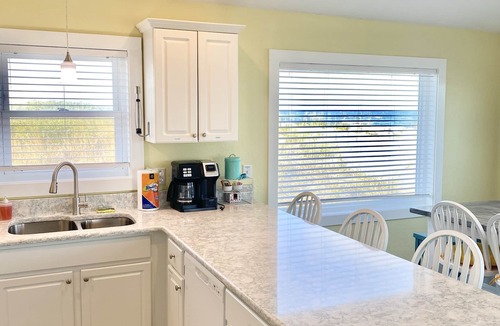 Sea Retreat House | Panoramic Ocean Views in this Updated Vintage Beach Cottage Right on the Beach!
