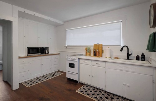 Olympia House | Pet-friendly 1917 Art Deco 2BR in Olympia, walkable downtown with workspace, parking, and modern comfort